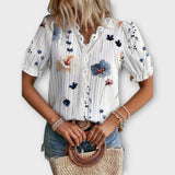 Olivia - Blusa elegante con un escote en V